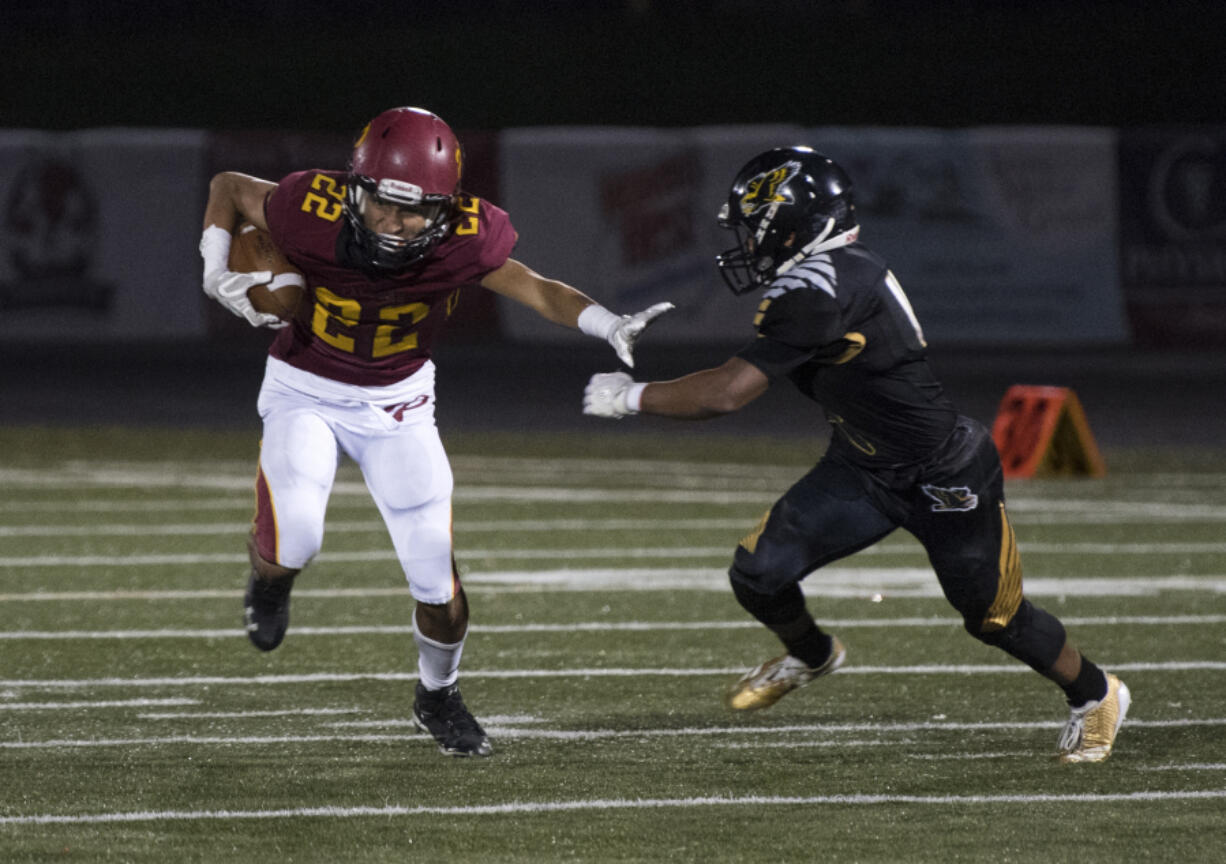 Alisha Jucevic/The Columbian A.J. Dixson, left, has moved to quarterback, one of many changes this season for a Prairie team looking to break into the playoffs.