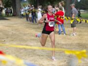 Fort Vancouver seniors Emily Phelps, above, and Anna Harrison have spent time speaking at Vancouver middle schools to inspire would-be runners to join the Trappers’ cross country team.