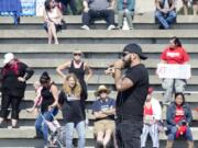 Joey Gibson speaks at a rally held by his Patriot Prayer Group at the Port of Vancouver Amphitheater in September. The event was moved to Vancouver from Portland in an attempt to avoid protesters.