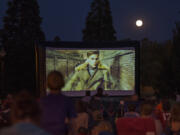 A full moon glows overhead July 27 as families pack Columbia Tech Center Park to watch the movie “Wonder Woman” underneath the stars. The film, which was free, was part of the Movies in the Park series hosted by the city of Vancouver.