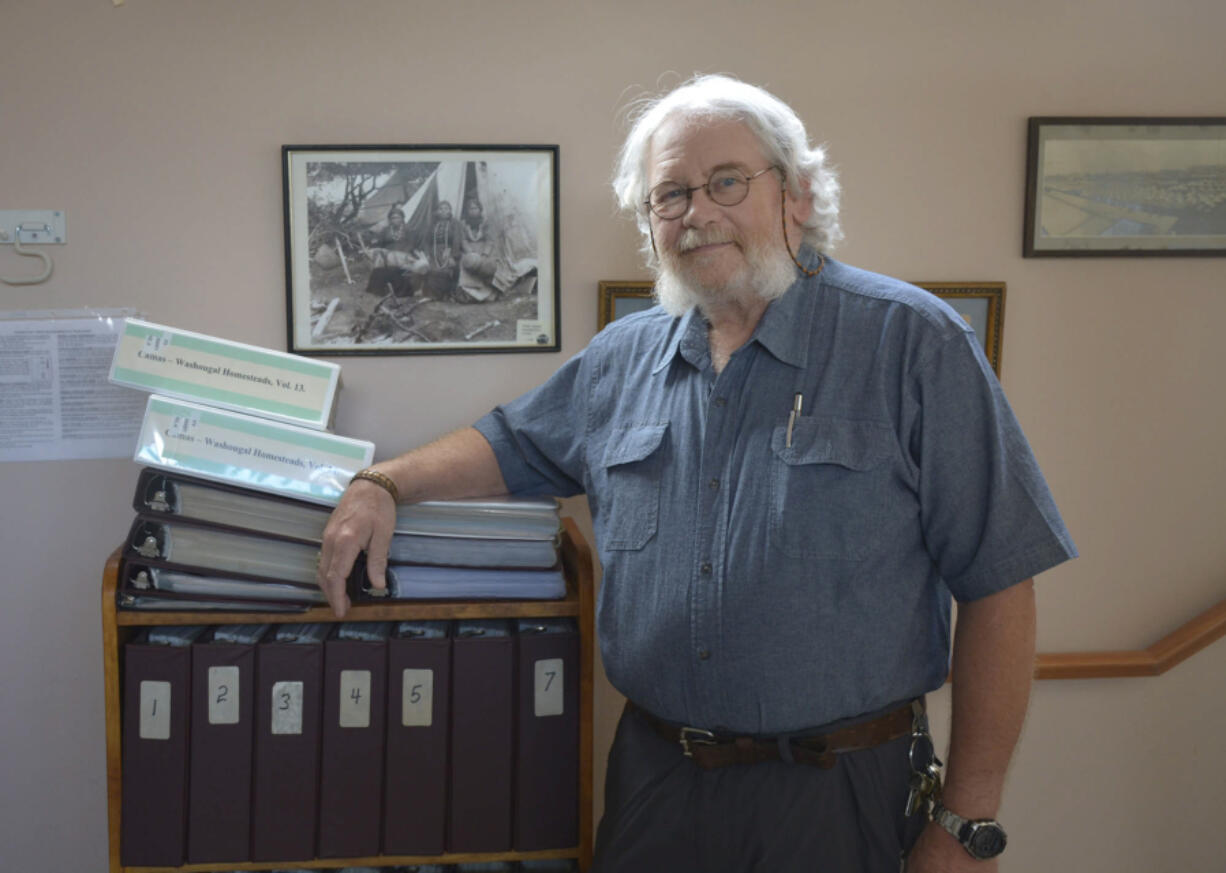 Washougal: Brian McClatchie, board member with the Camas-Washougal Historical Society, poses with research notes and a second set of Camas-Washougal Homestead Records donated to the Two Rivers Historical Museum.