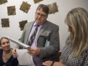 Clark County Assessor Peter Van Nortwick reads election results at the Clark County Public Service Center on Tuesday night.