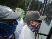 The Patriot Prayer movement, headed by Joey Gibson, gathers in Vancouver on Aug. 4 to board buses to take them to Gibson's speech at Tom McCall Waterfront Park in Portland. Patriot's Prayer, Proud Boys, and the Three Percenters load into transport buses headed to the Portland protest. Citing the potential for violence, Southwest Washington Communities United for Change canceled a planned rally scheduled for Saturday that was intended to be a show of unity and condemnation of what it says is growing racism in the area. An organization press release in advance of the now-canceled event specifically mentioned the Aug. 4 rally for Gibson.