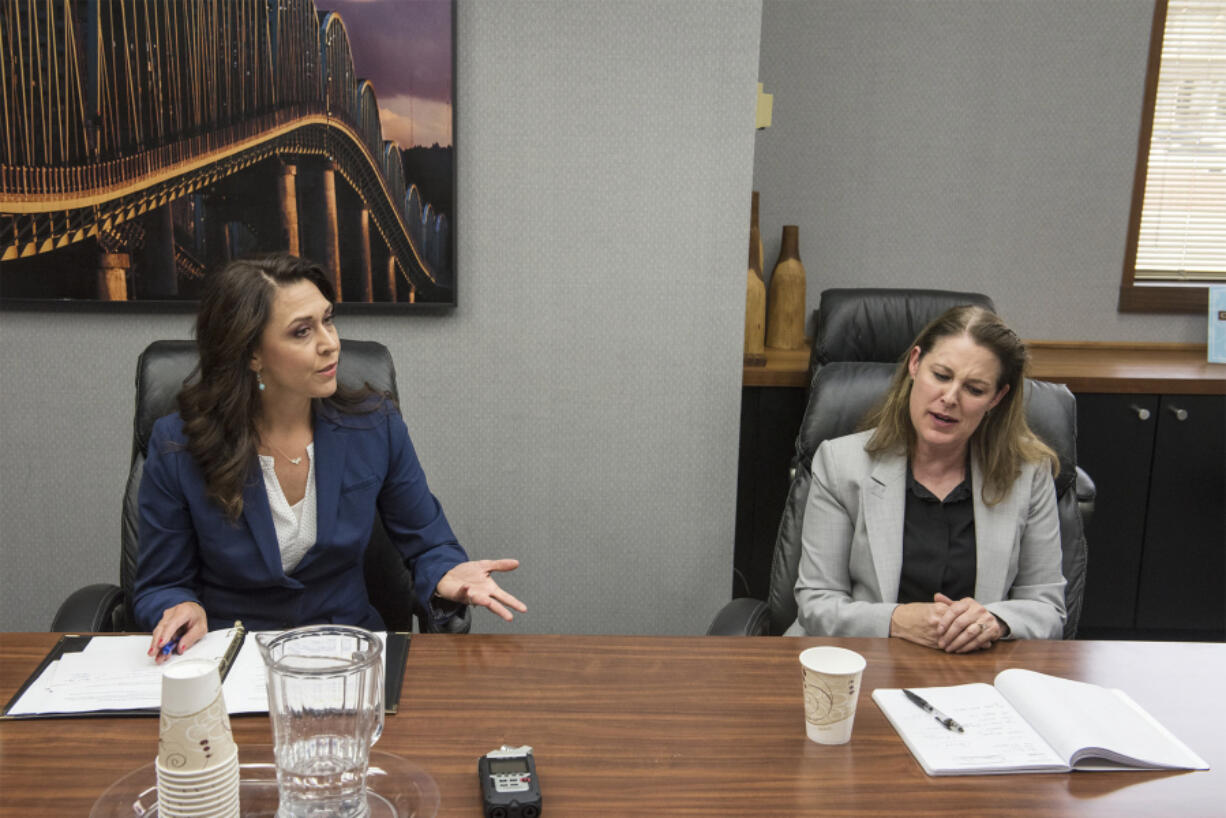 Incumbent U.S. Rep. Jaime Herrera Beutler, R-Battle Ground, left, and Democrat Carolyn Long debate each other for the first time in front of The Columbian’s Editorial Board on Aug. 8.