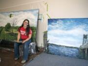 Trader Joe’s artist Crystal Humble Lary of Vancouver works on a mural of the Fort Vancouver apple orchard at a workspace near the Vancouver Trader Joe’s. Humble Lary paints murals for the store that focus on community landmarks and spaces around the Vancouver area.