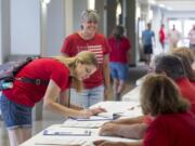 Vancouver Education Association members at a meeting at Columbia River High School on Thursday. Over the weekend, union members voted overwhelmingly in favor of a work stoppage if a new teacher contract is not in place before the start of the school year.