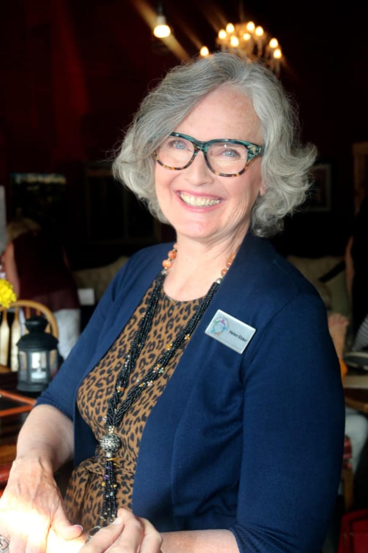 Camas: Helen Elder, chairwoman of Villages Clark County, at a 100 Women Who Care Clark County meeting, where the group donated 10,000 to the senior housing village project.