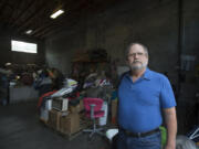 John Weber, the interim executive director of the Arc of Southwest Washington, looks over the nonprofit’s warehouse that stores donated goods. The nonprofit, which assists people with developmental and intellectual disabilities, has struggled financially for several years.