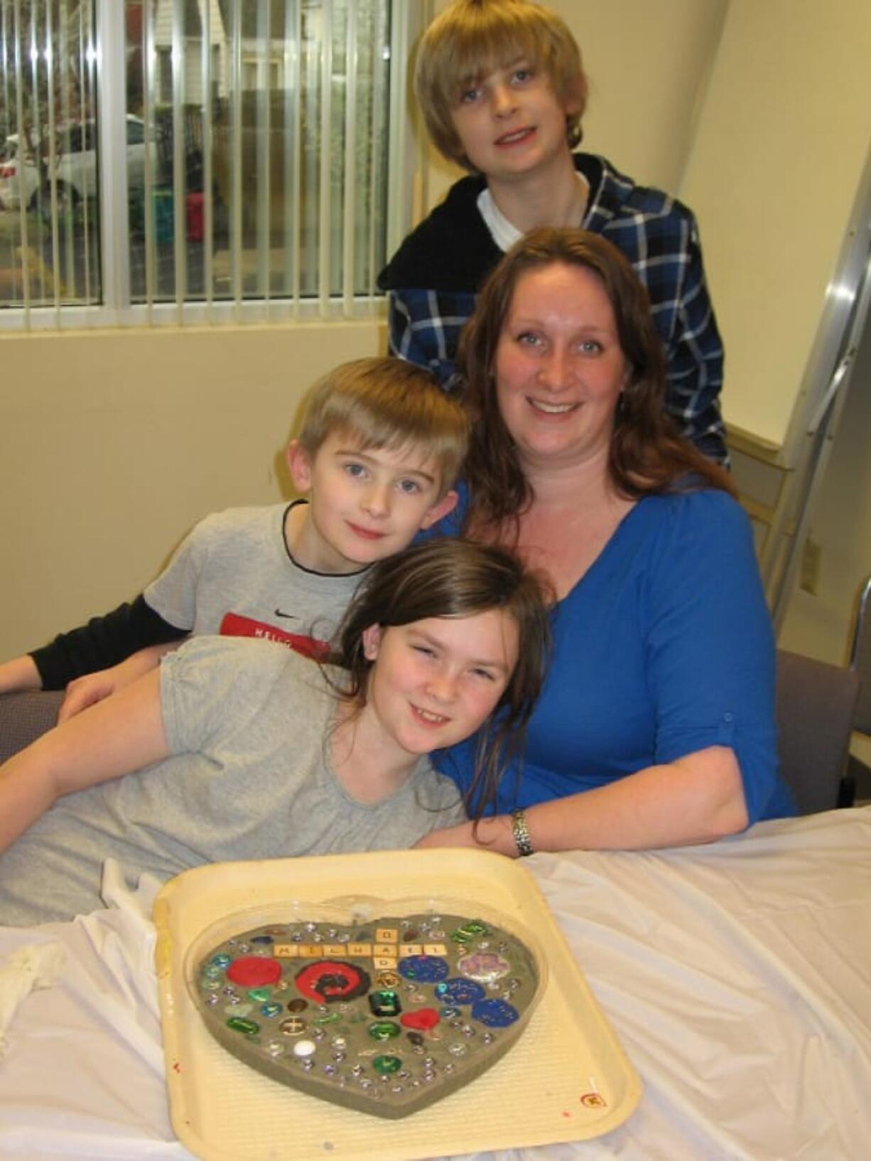 The Thomas family made a stepping stone in honor of husband and father Michael Thomas, who died on Father’s Day 2010.