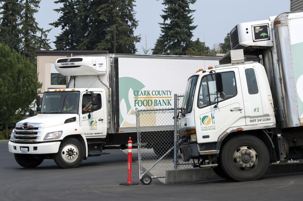 A delivery truck filled with donated food from Costco arrives on a Thursday afternoon in August at the Clark County Food Bank.