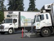 A delivery truck filled with donated food from Costco arrives on a Thursday afternoon in August at the Clark County Food Bank.