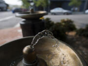 Water flows from a fountain donated by Ed and Mary Firstenburg. Although they appear vintage, they are less than 20 years old.