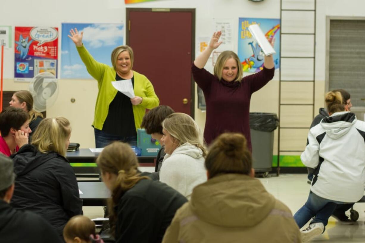 Woodland: Sonya Stemkoski, left, and Felicity Ottis taught parents from the Woodland Co-Op Preschool techniques for educating kids about disabilities.