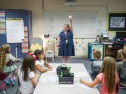 Second-grade teacher Jazmin Rebstock calls for her students’ attention on the first day of school at Woodland Intermediate School. With teacher strikes in the Evergreen and Washougal districts, Woodland was the only school district to open Tuesday in Clark County.