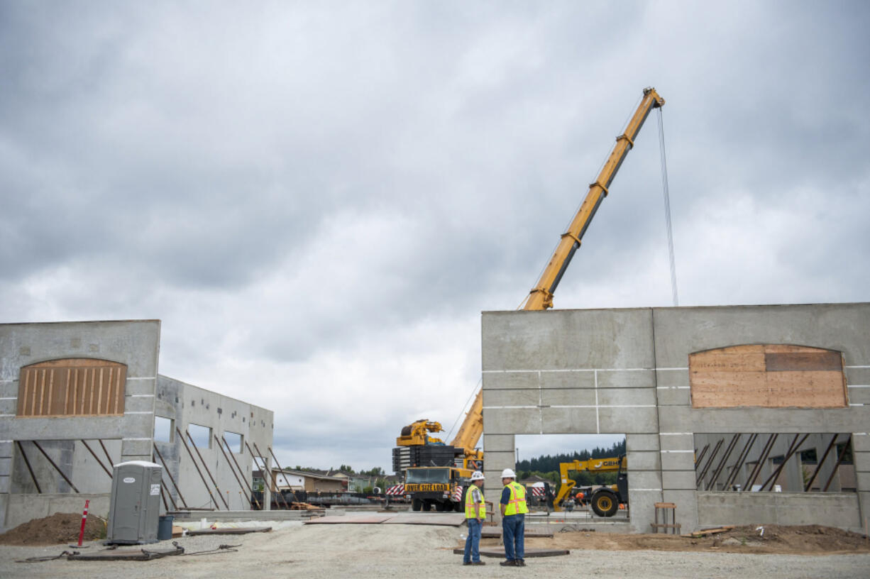 Crews work on the new SignalHound building, seen here at 1502 S.E. Commerce Ave. in Battle Ground on Thursday morning.