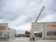 Crews work on the new SignalHound building, seen here at 1502 S.E. Commerce Ave. in Battle Ground on Thursday morning.