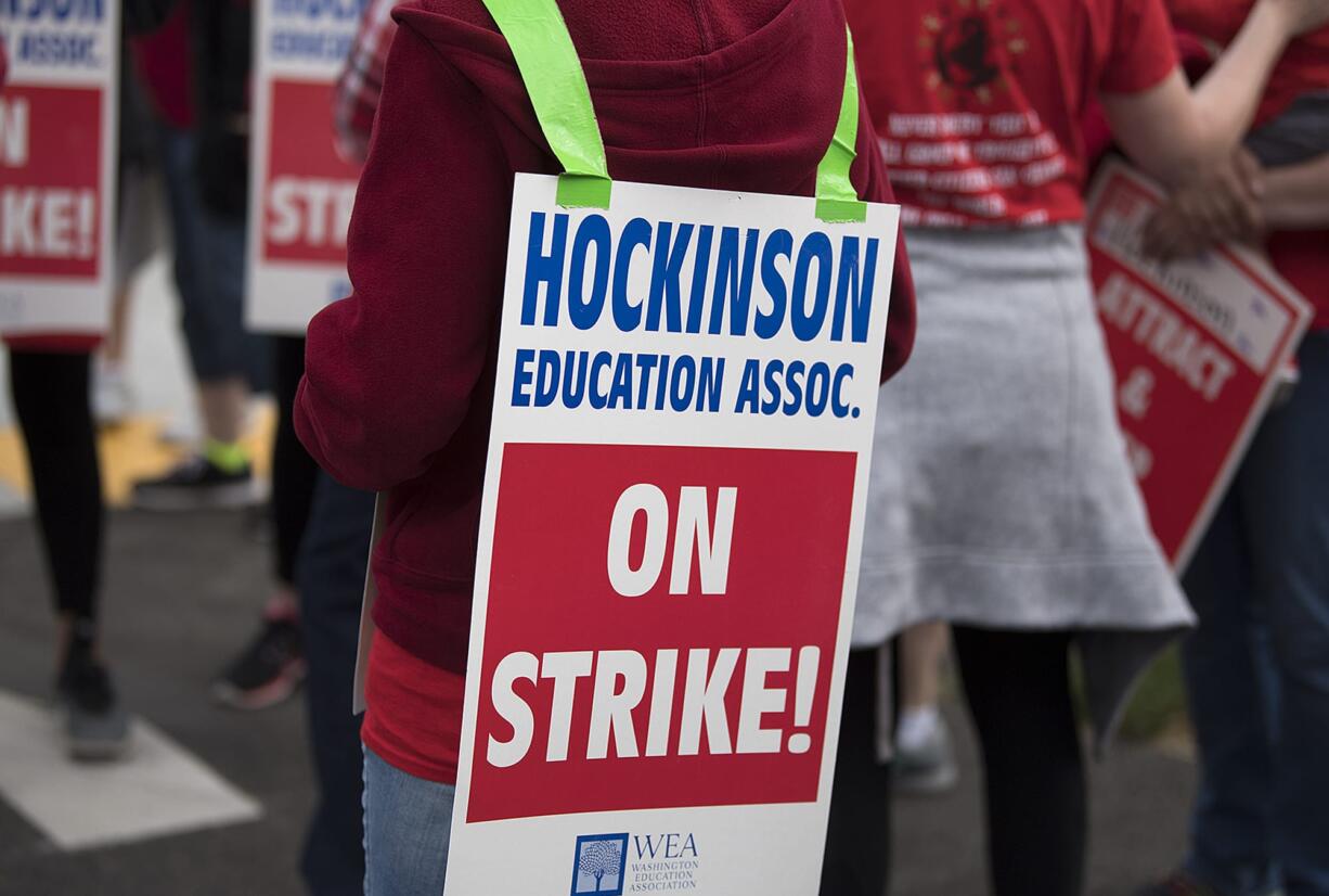 Hockinson teachers picket outside Hockinson Middle School with supporters on Friday morning, Aug. 31, 2018.