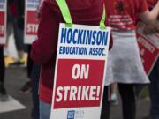 Hockinson teachers picket outside Hockinson Middle School with supporters on Friday morning, Aug. 31, 2018.