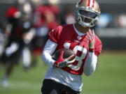 San Francisco 49ers wide receiver Dante Pettis runs during NFL football practice at the team’s headquarters Thursday, July 26, 2018, in Santa Clara, Calif.