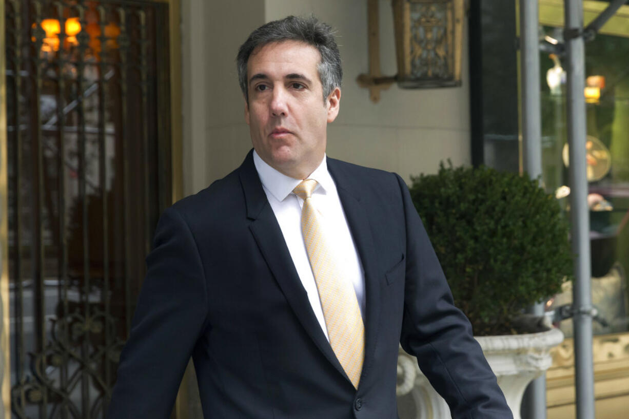 Michael Cohen, former personal lawyer to President Donald Trump, leaves his apartment building, in New York, Tuesday, Aug. 21, 2018.