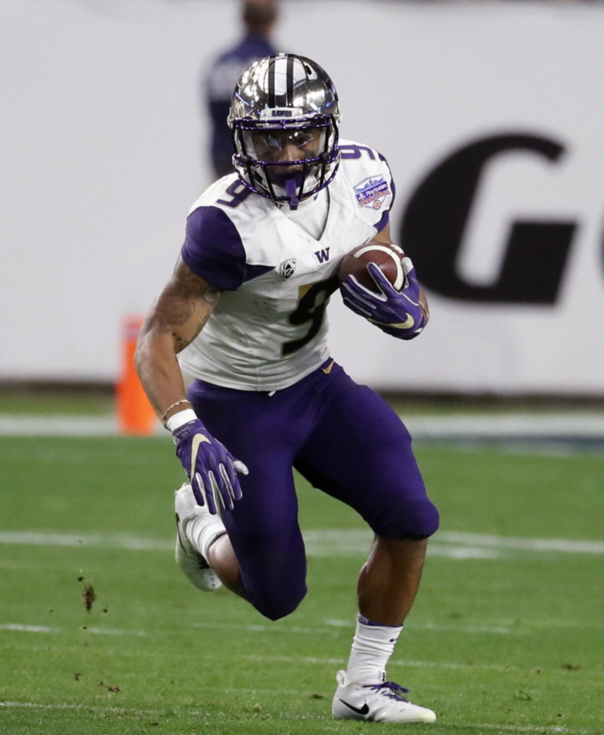 Washington running back Myles Gaskin (9) runs against Penn State during the Fiesta Bowl NCAA college football game, in Glendale, Ariz. Gaskin was selected to the AP Preseason All-America team, Tuesday, Aug. 21, 2018.