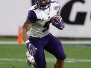 Washington running back Myles Gaskin (9) runs against Penn State during the Fiesta Bowl NCAA college football game, in Glendale, Ariz. Gaskin was selected to the AP Preseason All-America team, Tuesday, Aug. 21, 2018.