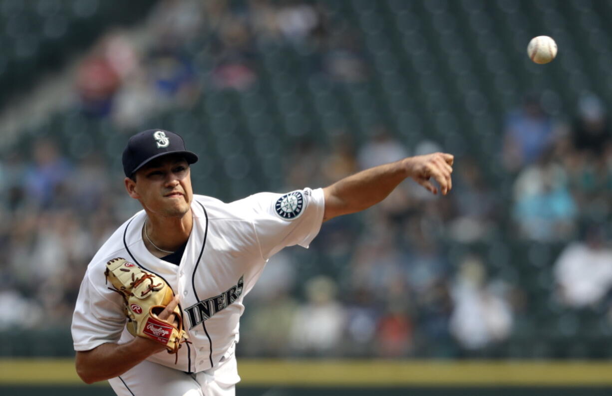 Seattle Mariners starting pitcher Marco Gonzales throws against the Houston Astros in a baseball game Wednesday, Aug. 22, 2018, in Seattle.