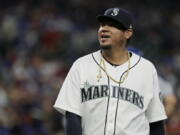 Seattle Mariners starting pitcher Felix Hernandez smiles as he walks off the field following the top of the fifth inning of the team’s baseball game against the Toronto Blue Jays, Thursday, Aug. 2, 2018, in Seattle. Hernandez was relieved by Adam Warren in the sixth inning. (AP Photo/Ted S.