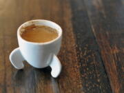 This undated photo provided by Craig S. Kaplan shows the Rocket Espresso Cup, designed by Craig S. Kaplan and available at Shapeways.com. Consider a coffee-themed gift this holiday season to please your java-heads. (Craig S.