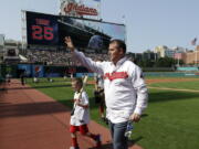 Former Cleveland Indians and Hall of Famer Jim Thome waves to fans before a baseball game between the Cleveland Indians and the Baltimore Orioles, Saturday, Aug. 18, 2018, in Cleveland. The club’s career home run leader, Thome was honored during a ceremony Saturday. Thome belted 337 of his 612 career homers during two stints with the Indians and his powerful swing helped the club rise from perennial laughingstock to one of baseball’s best teams in the 1990s.