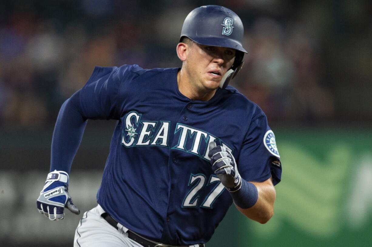 Seattle Mariners’ Ryon Healy (27) runs the bases after Cameron Maybin’s single during the sixth inning of a baseball game against the Texas Rangers, Monday, August 6, 2018, in Arlington, Texas.