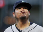 Seattle Mariners starting pitcher Felix Hernandez reacts after allowing a soft bunt-single by Texas Rangers’ Carlos Tocci during the third inning of a baseball game Tuesday, Aug. 7, 2018, in Arlington, Texas. The Rangers won 11-4.