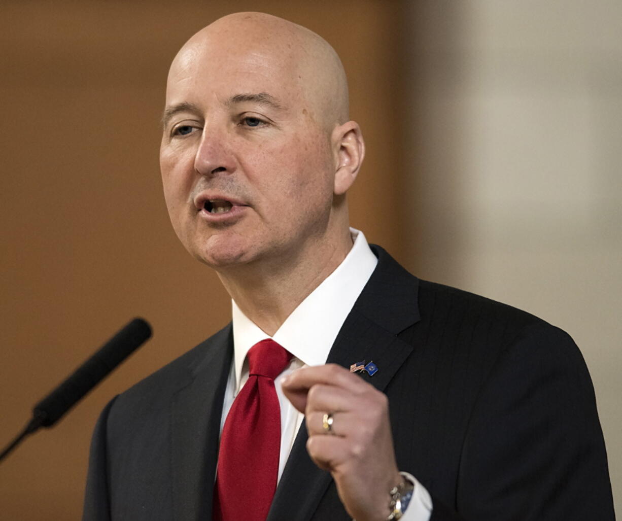 Nebraska Gov. Pete Ricketts speaks at the legislature, in Lincoln, Neb. Three years after Nebraska lawmakers voted to abolish capital punishment, the state is preparing to carry out its first execution since 1997 on Tuesday, Aug. 14, 2018, in an about-face driven largely by Republican Gov. Pete Ricketts who helped finance a ballot drive to reinstate the punishment after lawmakers overrode his veto and abolished the punishment in 2015.