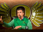 FILE - In this March 6, 2018, file photo, Oregon football head coach Mario Cristobal gestures during a news conference in Eugene, Ore.