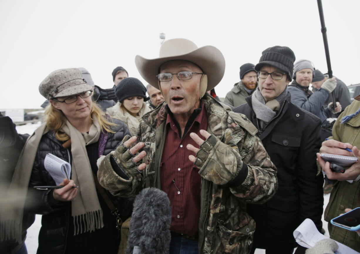 Robert “LaVoy” Finicum, center, talks to reporters Jan. 5, 2016, at the Malheur National Wildlife Refuge. He was shot and killed 21 days later by Oregon State Police.