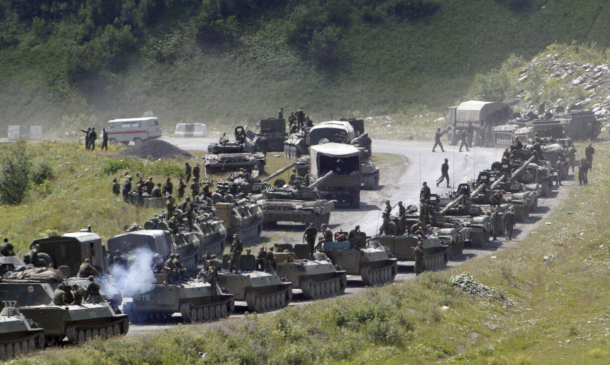 A column of Russian armoured vehicles seen on their way to the South Ossetian capital Tskhinvali somewhere in the Georgian breakaway region, South Ossetia, Georgia. The Russian military quickly routed the Georgian army during the August 2008 war. Russia’s Prime Minister Dmitry Medvedev in an interview broadcast by Russian state television Tuesday Aug.