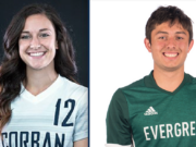 Riley Smetzler, left, and Levan Zhividze, members of the Corban University soccer program.