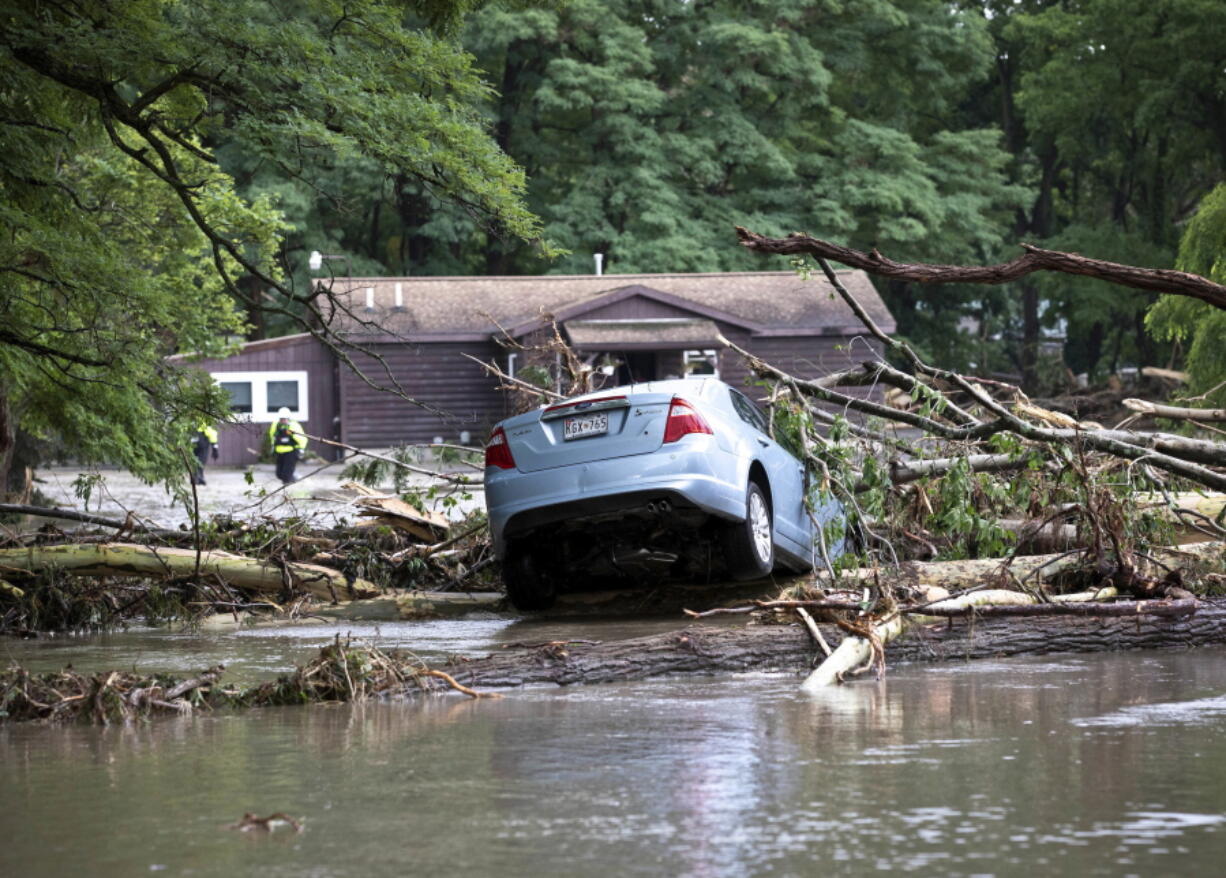 This photo provided by Governor Cuomo’s Press Office shows destruction from flooding in the Lodi area of New York on Tuesday, Aug. 14, 2018, shows.