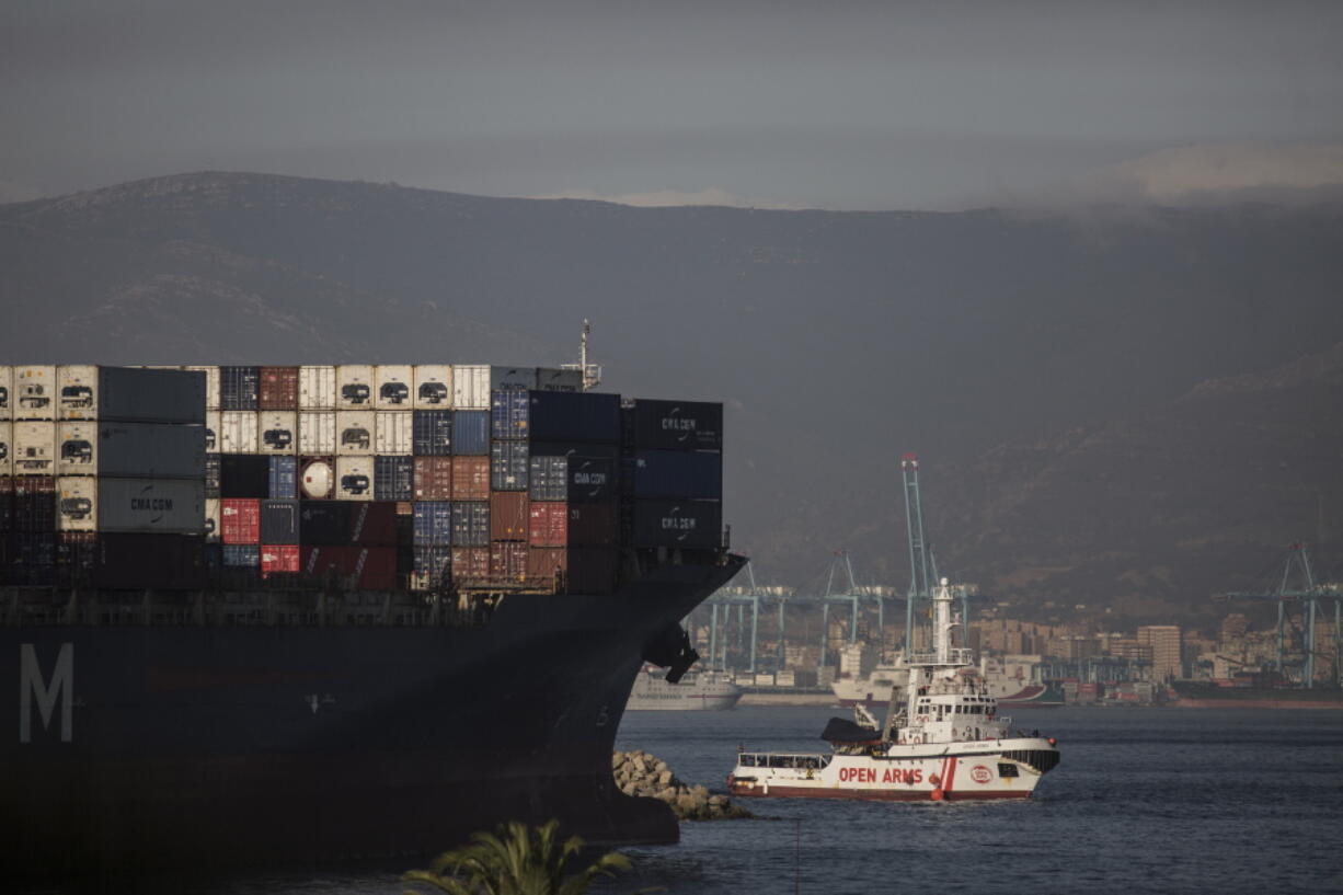 The Open Arms Search and Rescue vessel arrives in Algeciras, Spain, on Thursday. A rescue boat operated by Spanish aid group Proactiva Open Arms carrying 87 African migrants and refugees saved in the Mediterranean Sea has docked at the southern Spanish port of Algeciras after other, geographically closer, European Union countries refused to let it dock amid continuing strain between governments about how to respond to the wave of migrants crossing from Africa.