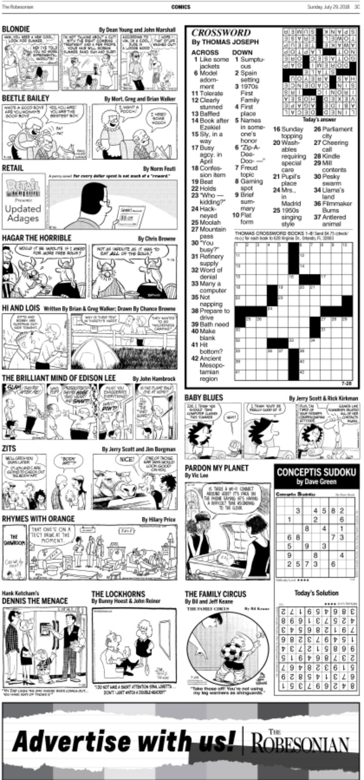 This newspaper page provided by The Robesonian shows the layout of comic strips in the first Sunday issue after the paper in Lumberton, N.C., announced it’s dropping an 8-page color comics section from Sunday editions. A newspaper editorial said it cut the comics because of rising newsprint costs spurred by Trump administration tariffs on imported paper.