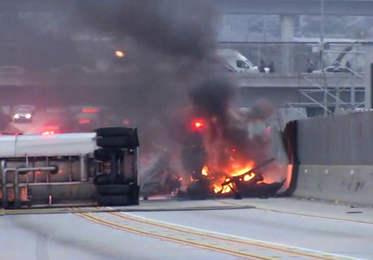 A fuel tanker that crashed and burned early Friday, Aug. 24, 2018, on a highway near Los Angeles International Airport, causing a massive traffic jam. The California Highway Patrol received reports of the crash involving the tanker and an SUV followed by a fireball on the westbound side of Interstate 105 in suburban Hawthorne shortly after 5 a.m.