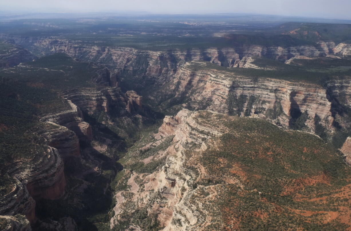 FILE - This May 8, 2017, file photo shows Arch Canyon within Bears Ears National Monument in Utah. A judge says the U.S. government doesn’t have to turn over documents to an environmental law firm about legal arguments behind President Donald Trump’s decision to shrink national monuments. U.S. District Judge David Nye ruled Monday, Aug. 6, 2018, that the records are protected presidential communications.