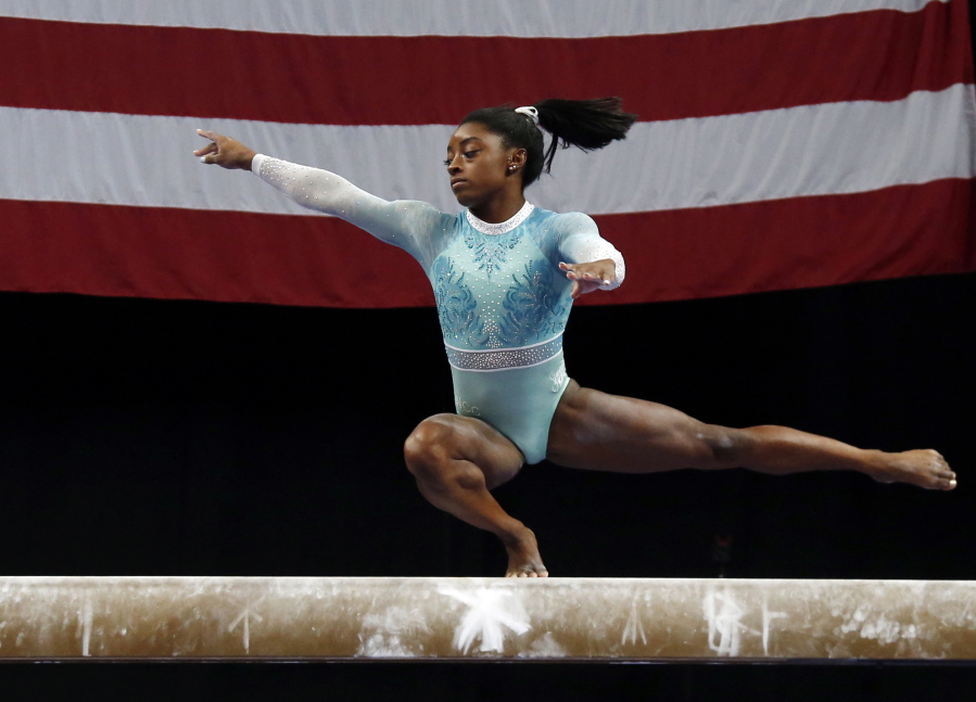 Simone Biles wins two more gold medals for USA at World Championships to  extend gymnastics record, Olympics News