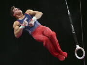 Sam Mikulak competes on the rings at the U.S. Gymnastics Championships, Saturday, Aug. 18, 2018, in Boston.