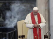 Pope Francis prays during an audience in St. Peter’s square at the Vatican. The Vatican said Thursday Aug. 2, 2018, that Pope Francis has changed church teaching about the death penalty, saying it can never be sanctioned because it “attacks” the inherent dignity of all humans.