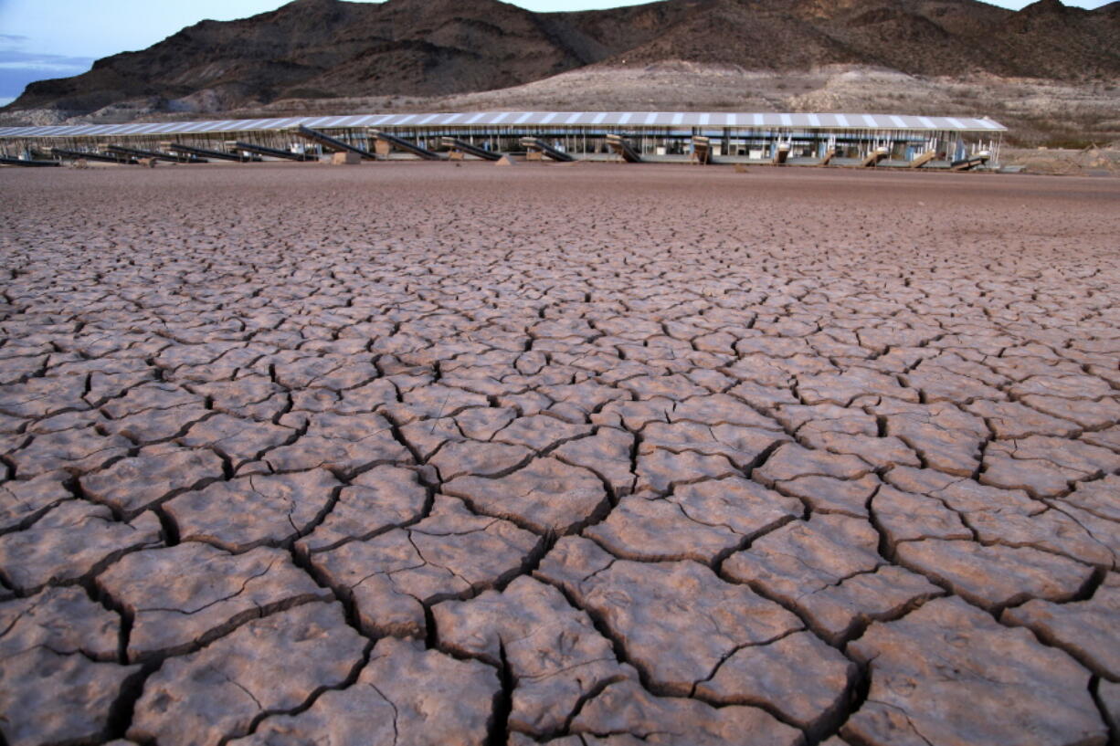 What was once a marina sits high and dry due to Lake Mead receding in the Lake Mead National Recreation Area near Las Vegas in this July 2014 photo. Nevada’s top state water official has dealt a severe blow to plans for Las Vegas to pump drinking water from arid valleys west of the Nevada-Utah state line.