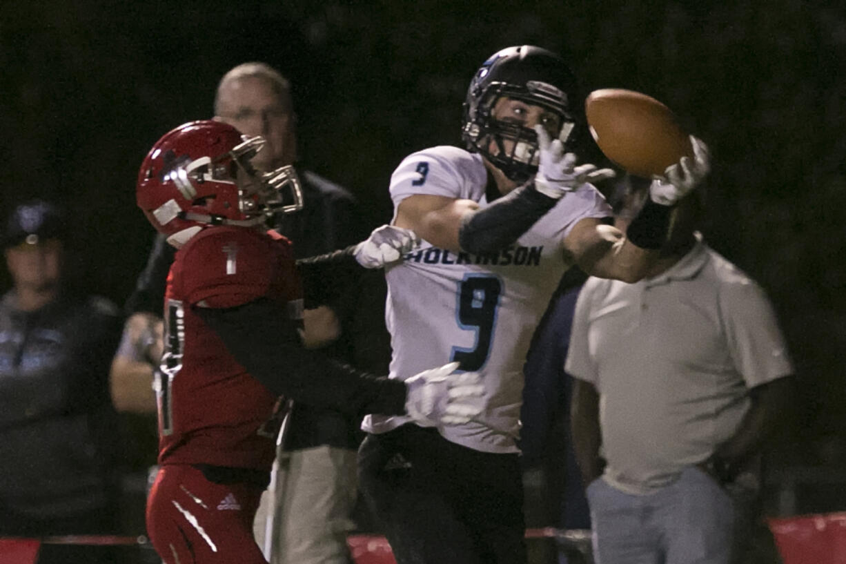 Hockinson’s Peyton Brammer (right) makes a touchdown reception with Archbishop Murphy’s Matthew Mavis. Brammer had x catches for x yards.