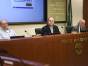 Port of Vancouver’s board of commissioners from left, Don Orange, Eric LaBrant and Jerry Oliver, listen to public statements during a board meeting in January.