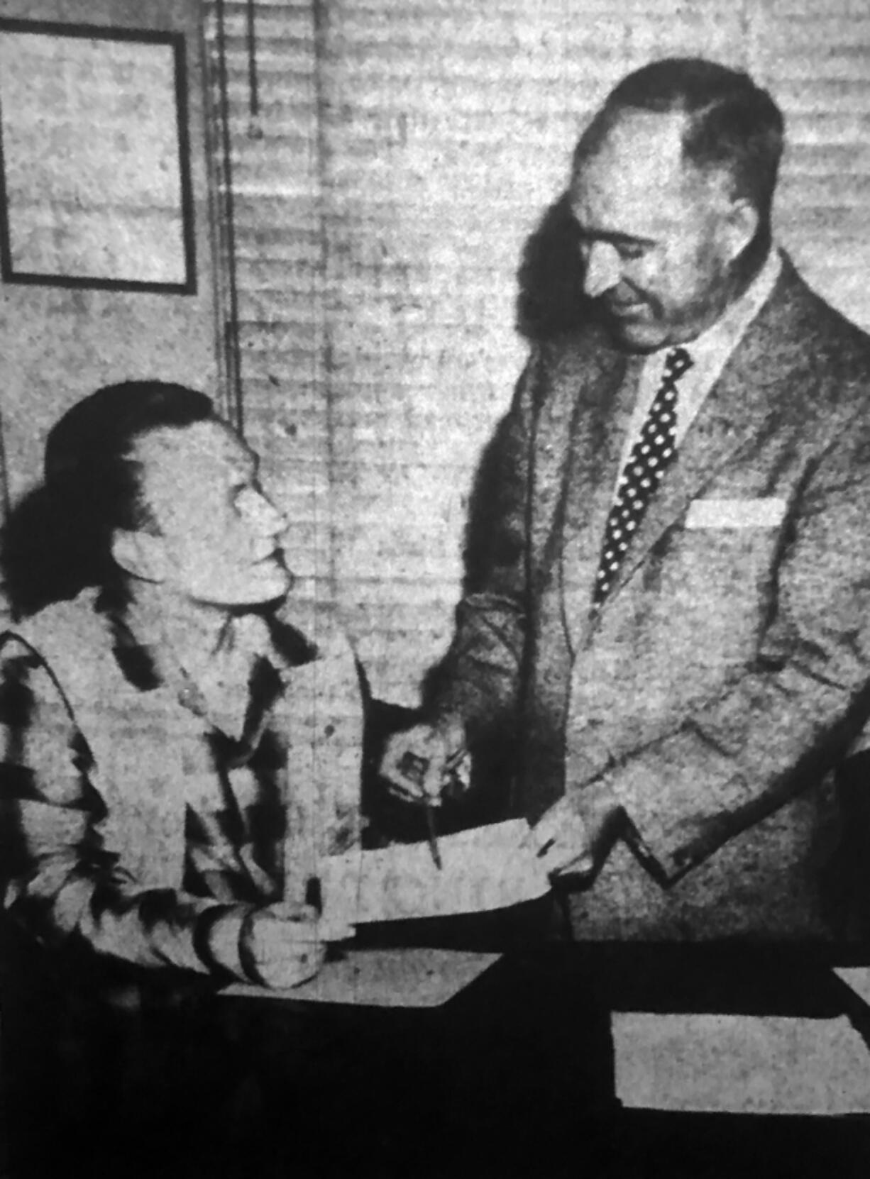 The Columbian, May 1, 1957: “Gene Nordstrom, seated, a junior at Fort Vancouver High School, was city manager of Vancouver today as students from Vancouver’s two high schools and Providence Academy participated in Student Government Day at city hall. The youthful administrator receives some pointers on the duties of his office from his official counterpart, City Manager James E. Neal. Some 30 youngsters, appointed to the city’s top administrative positions, observed city government in action during the day.