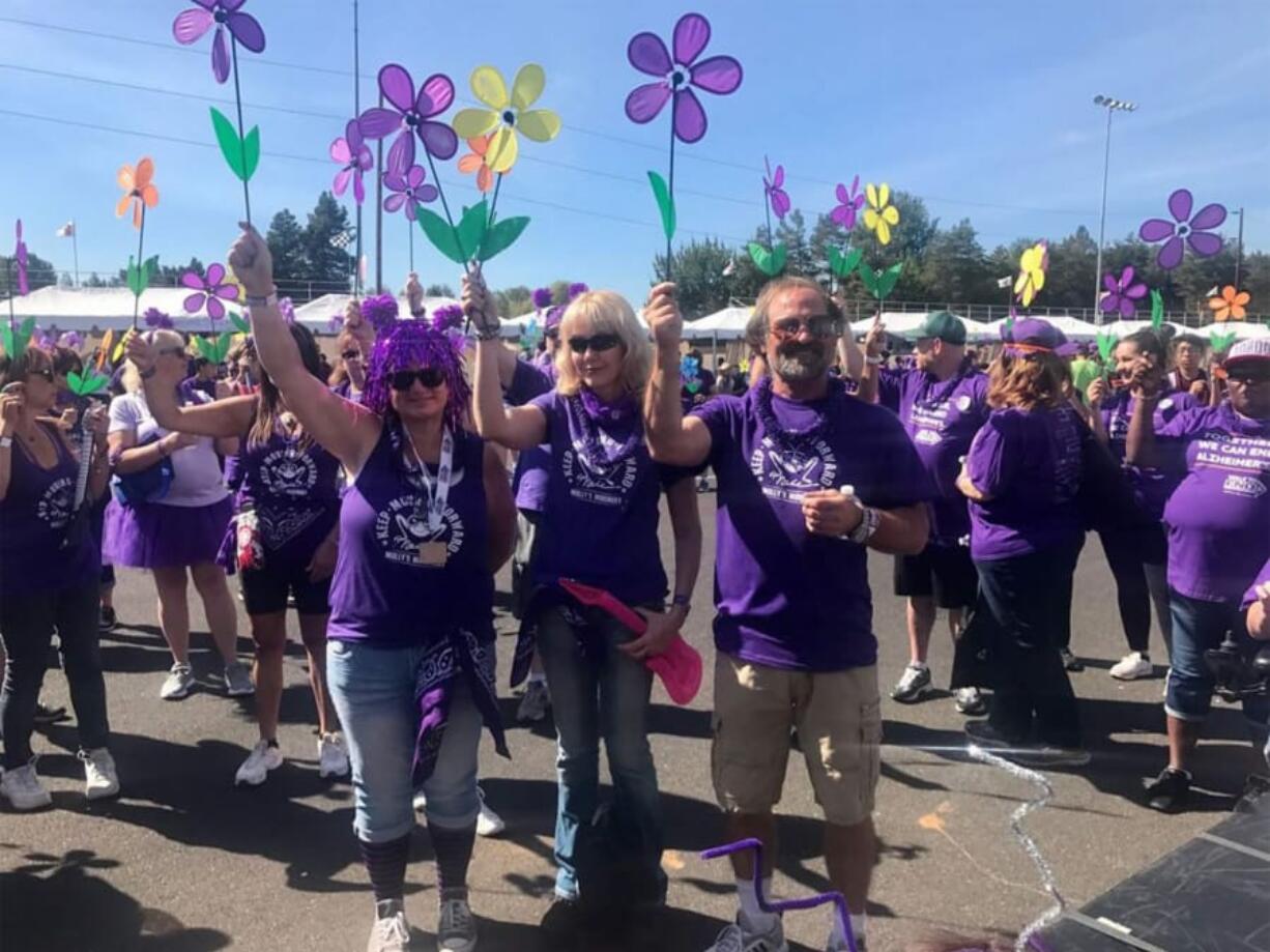 Penny Baggett, center, will walk in Vancouver’s first ever Walk to End Alzheimer’s at Esther Short Park in honor of her late father Don, who had Lewy Body Dementia. Baggett has previously participated twice in Portland’s walks, and finds that they provide a sense of community.